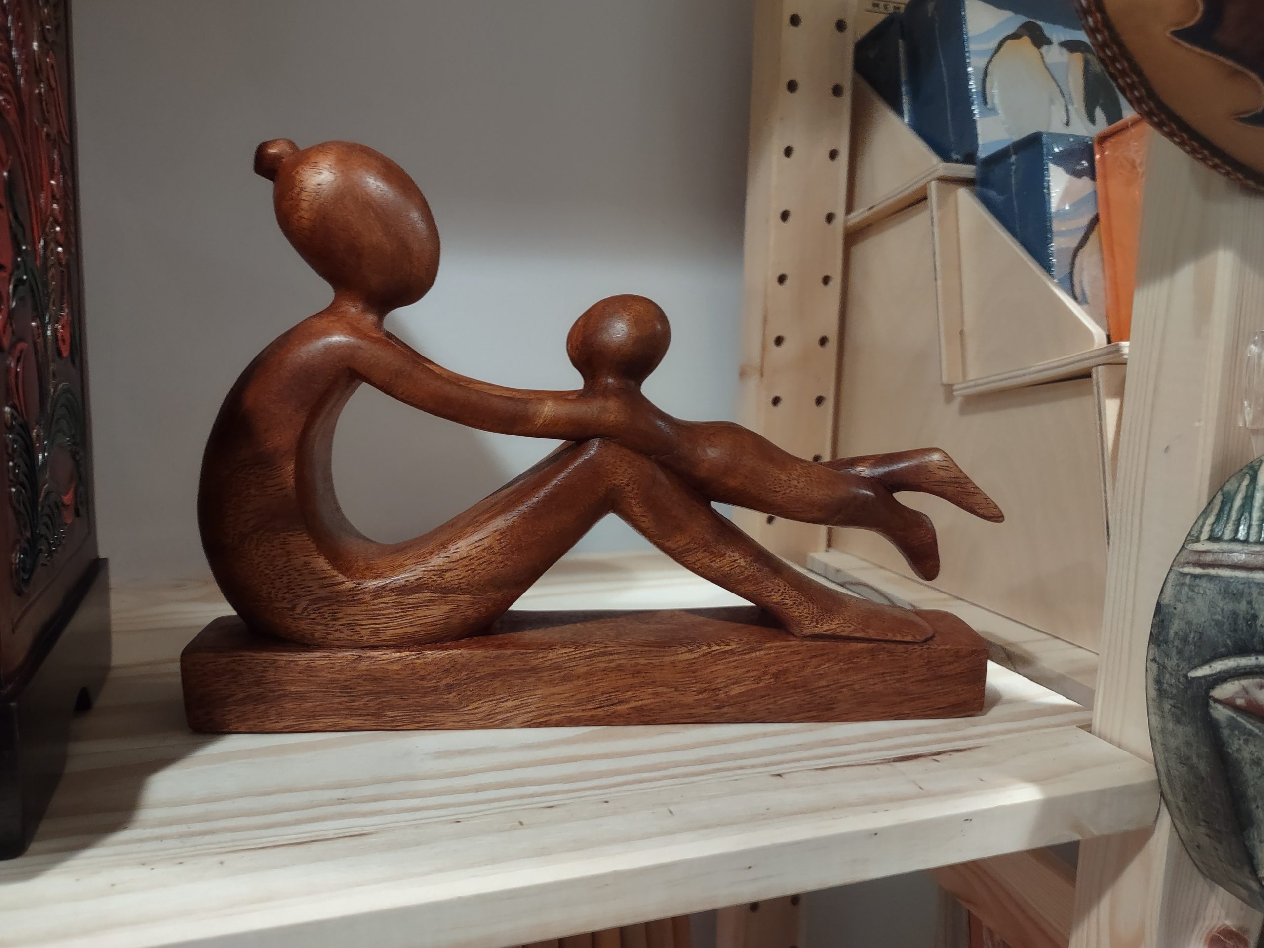 Mother and child wood sculpture from Indonesia